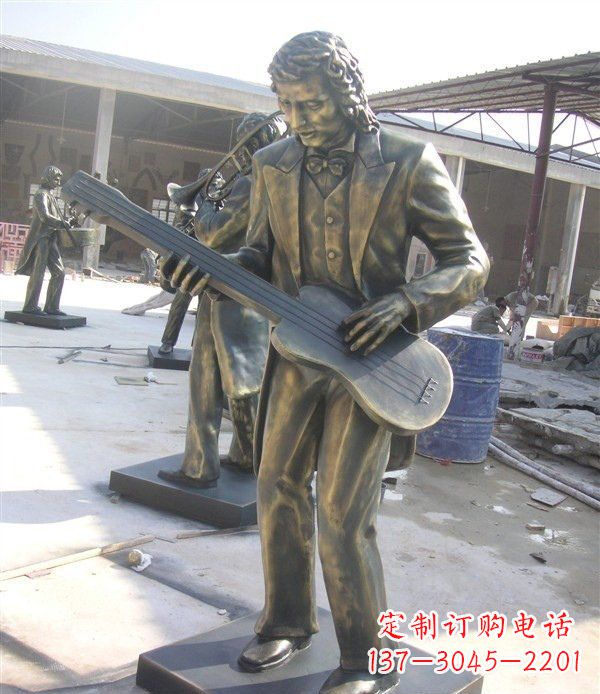 丽水西方人物铜吉他雕塑