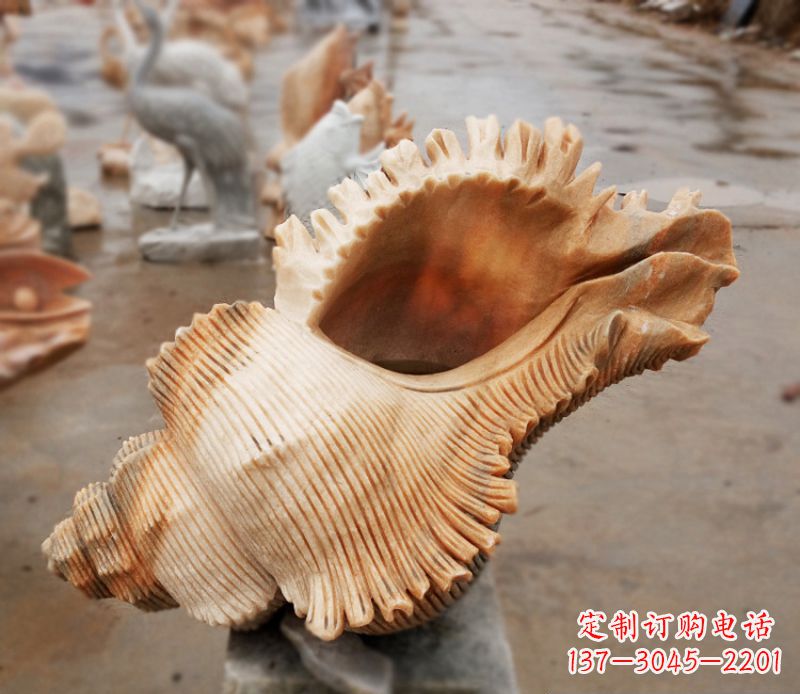 丽水晚霞红海螺石雕广场景观雕塑