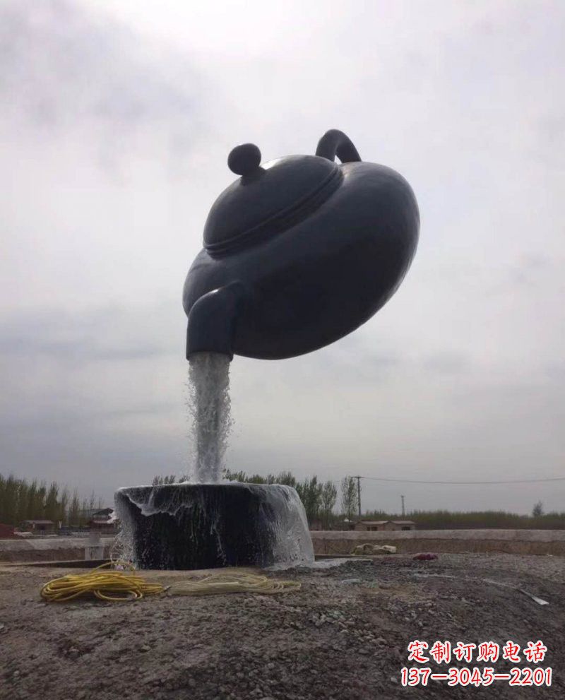 丽水新疆流水的茶壶铜雕